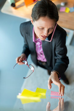 Arranging Sticky Notes on a Glass Board