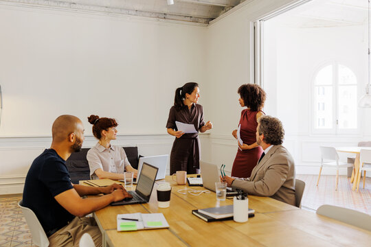 Business professionals working together during meeting at office