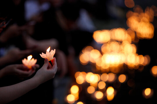 People holding Krathong