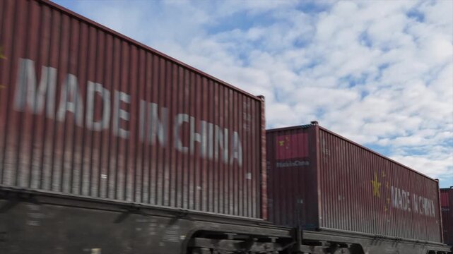 Cargo train carrying Chinese shipping containers, freight transportation