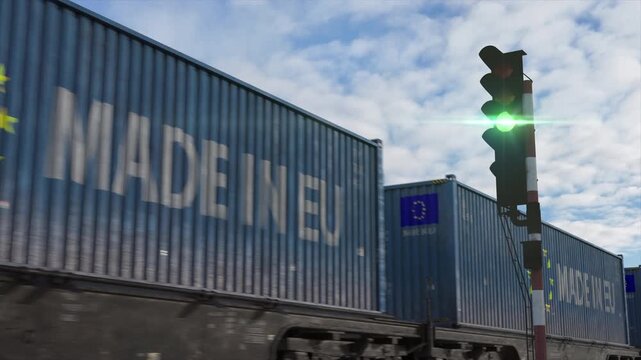 Freight train with EU cargo containers passing by, international logistics