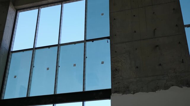  Industrial interior of a marble processing plant with heavy slabs and manufacturing equipmen