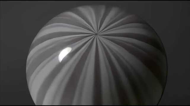 Close View Of Intricate Patterned Umbrella Dome Showing Light Reflection And Curved Lines