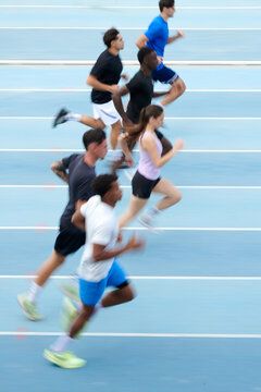 Motion blur photo of a Running Club athletes