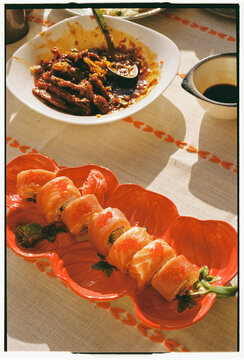 Salmon Sushi Rolls and Braised Meat on Balcony Table, Funchal