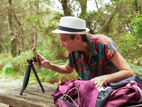 Woman Packing Hiking Backpack