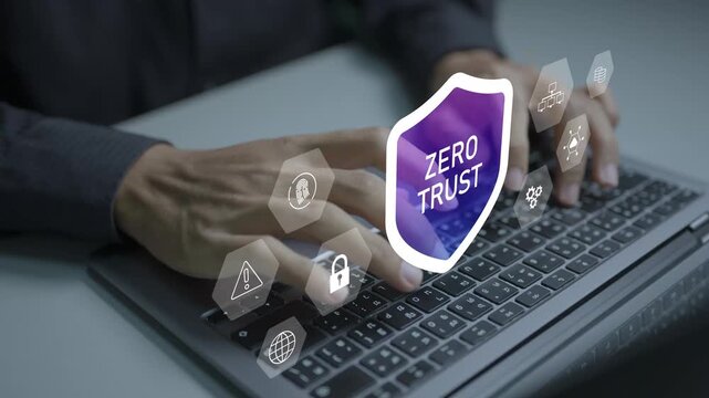 Zero Trust concept. Person using laptop with Zero Trust security and identity verification icons, secure authentication, access control, cybersecurity and data protection.