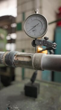 Pressure measurement with a manometer during industrial quality control. Conceptual engineering equipment for control.