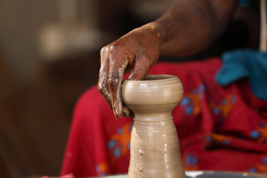Potter makes beautiful caly pot