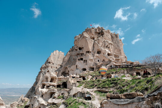 Explore the breathtaking rock formations and cave dwellings of Cappadocia, Turkey