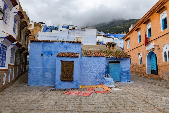 Picturesque square in the famous blue town Chefchaouen in Northern Morocco