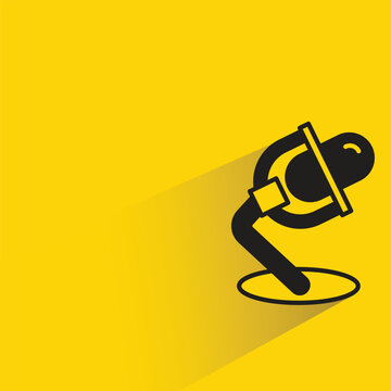 microphone icon with drop shadow on yellow background