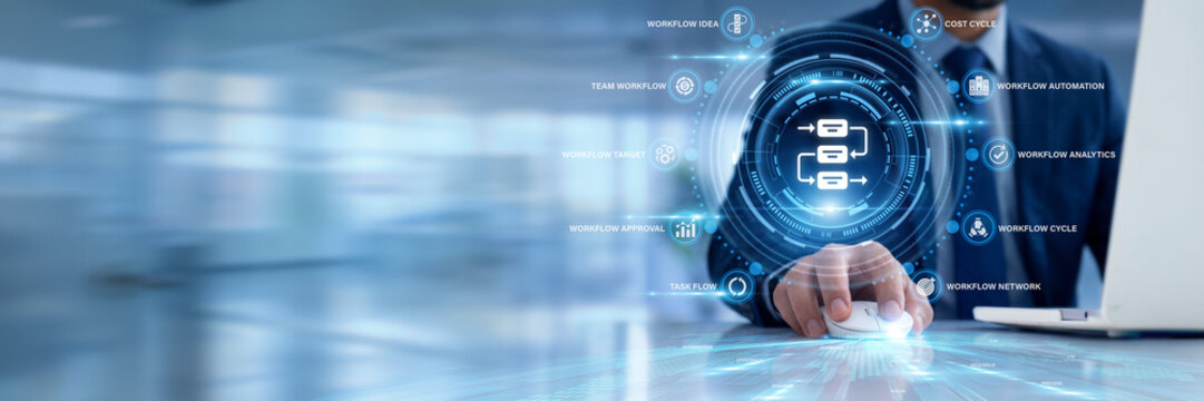 Businessman using a laptop for Workflow data analysis, mapping procedural corporate task automation paths, monitoring operational pipeline handoffs, and eliminating team production friction points.