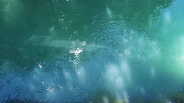 Clear emerald mountain river flowing through Martvili canyon, rippling water surface, nature travel footage