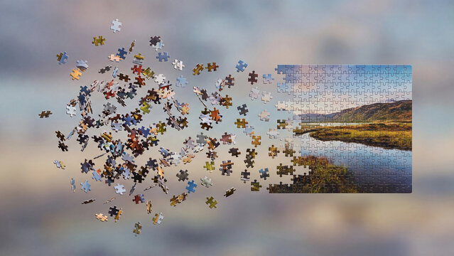 Jigsaw puzzle pieces scattering away from a completed landscape image for problem solving disintegration change management and business transformation concept