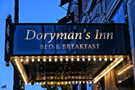 NEWPORT BEACH, CALIFORNIA - 18 JUNE 2026: Sign at the Dorymans Inn Bed and Breakfast at the pier on the Balboa Peninsula.