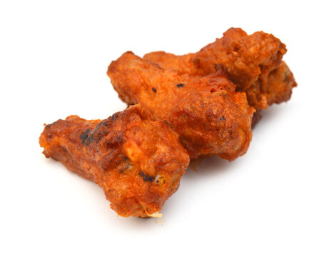 Fried chicken wings on white background 