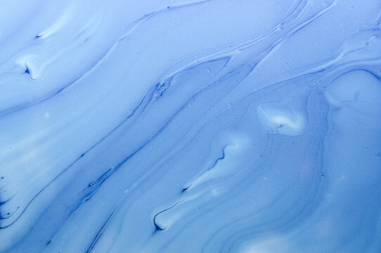 Blue abstract design with smooth flowing lines and patterns