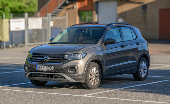 Gothenburg, Sweden - May 24 2026: Grey Volkswagen T Cross parked in quiet urban parking lot.