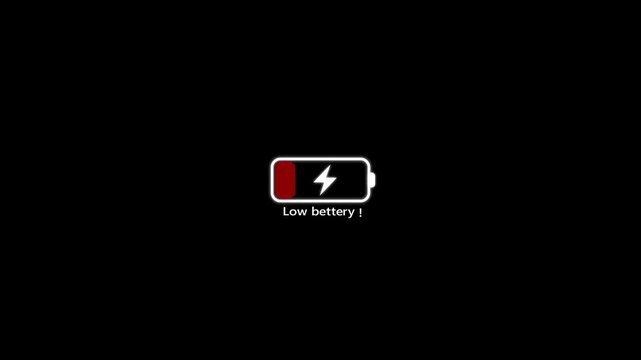 
Animation featuring a low battery red icon against a black  background,the battery charge indicator needs to be charged.