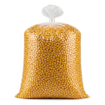 A clear plastic bag filled with bright yellow dried corn kernels isolated on white