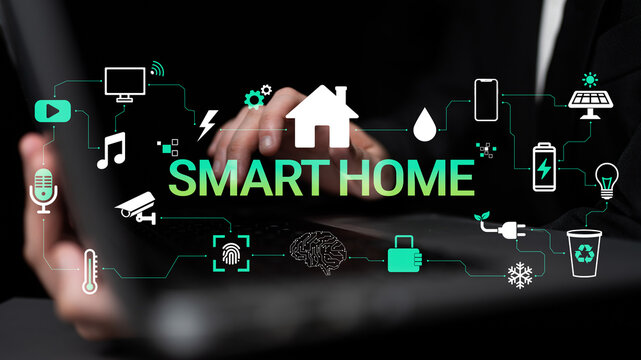 Innovative Technology for Smart Home Systems with Connectivity and Automation Features Shown on Laptop Screen with Icons and User Interaction Haptic.