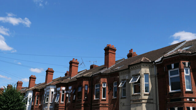 Terraced house, chimney, roof, victorian, sky, row of traditional British victorian terraced houses under blue sky
