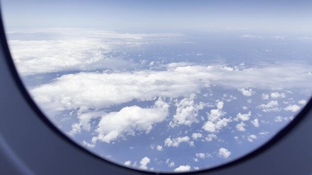 Above the clouds. Kauai is in the distance. Flights from Daniel K. Inouye International Airport in Honolulu, Oahu, Hawaii, to Narita Airport in Tokyo, Japan. The Airbus A380