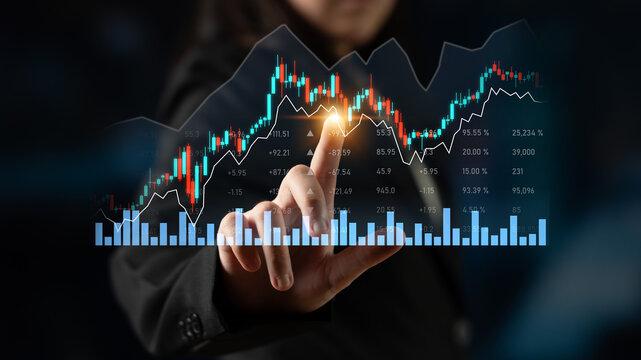 A business professional engages with digital charts displaying stock market trends and data. The modern interface highlights financial performance and growth analysis. Scalp