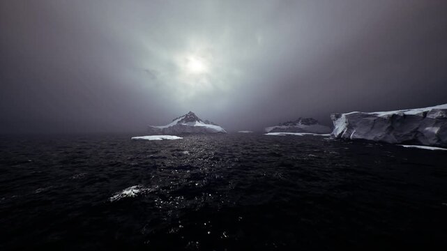Dark icy sea under dim sun, polar research vessel approaching distant iceberg. Reflective water trails toward glacial floes, brooding cloudscape evokes