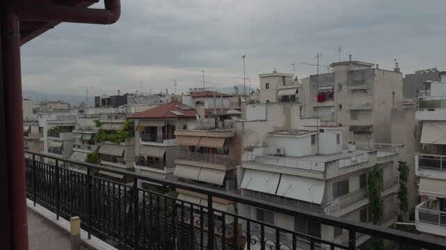 Overcast Sky Above European City. Residential Buildings View From Balcony