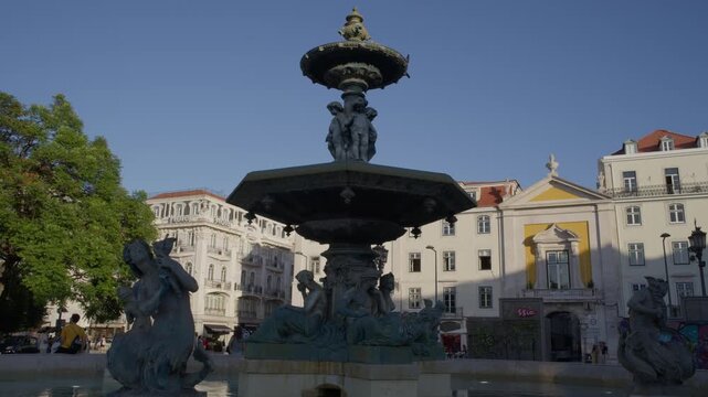 Rossio Square Fountain in Lisbon Portugal During Summer Golden Hour Shot with Cinema Camera