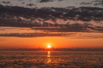 Fototapeta premium Beautiful summer sunset over the sea.