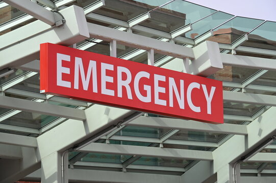 Red Emergency Sign at a hospital ER ED entrance, emergency room department
