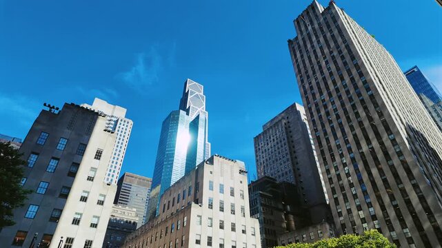 Blue sky between streets and buildings in New York
