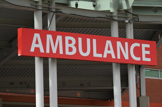 Red Ambulance Sign at a hospital ER ED entrance, emergency room department