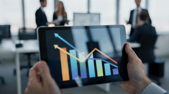 Clear focus on digital rate comparison tools displayed on a tablet screen highlighting fluctuating mortgage rates against a blurred office environment.