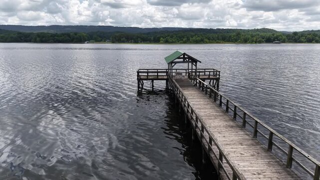 Aerial Close-Up of a Covered Wooden Pier on the River in Scottsboro, Alabama