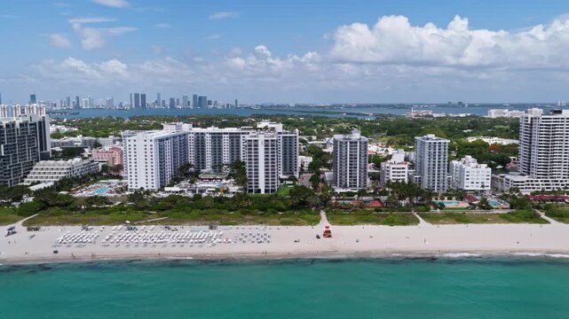 Aerial view of Miami skyline. Drone shot of Miami cityscape. Top view of South Miami and the ocean. Miami skyline with skyscrapers and coastline from above.