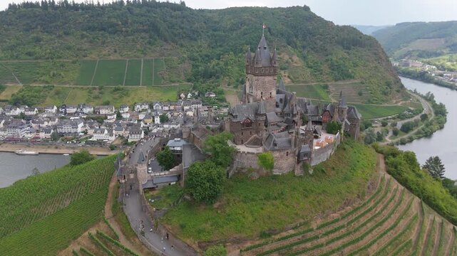 Reichsburg Cochem Establishing Pedestal down shot above the Moselle river and old town