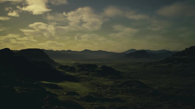 Foreboding mountain silhouette against moody sky, sharp peaks and textured slopes create dramatic tension, suitable for mountaineering editorials and cinematic