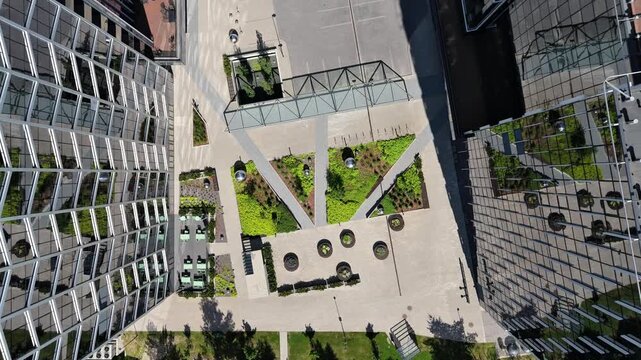 Aerial Top Down View of Modern Glass Business Center Courtyard