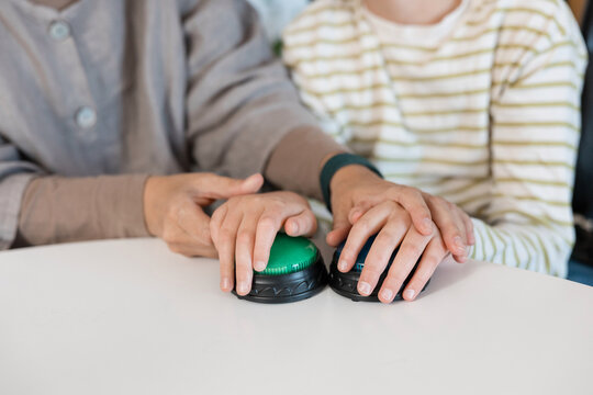 Mother and child doing sensory communication activities