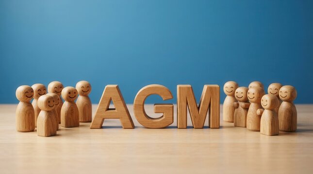 Conceptual image representing a group of people and the acronym AGM for an annual general meeting.