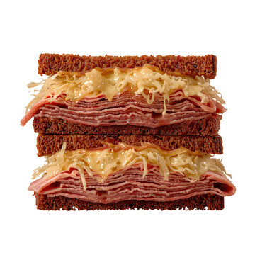Tall reuben sandwich with layers of corned beef and sauerkraut on dark rye bread isolated on black background isolated on a transparent background