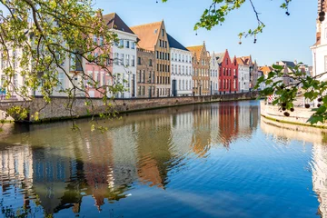 Medieval architecture along Spiegelrei canal in Brugge, Belgium © Mistervlad