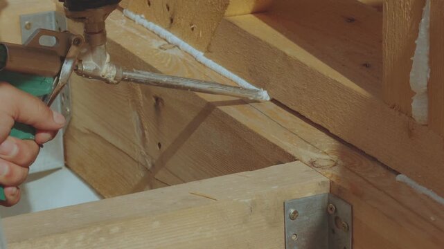 Construction foam, application of construction foam, construction of a frame house, insulation of a house