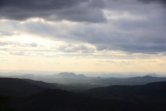 scenic mountain range landscape view from monte das gameleiras rio grande do norte brazil, sunset landscape over mountain layers and valley under cloudy sky monte das gameleiras rn, panoramic view 