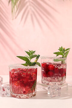 Mojito with sprite, mint and fresh berries,Detox water with raspberries, cherries, and currants, over ice. A refreshing summer homemade lemonade cocktail. Fruit juice and ingredients,