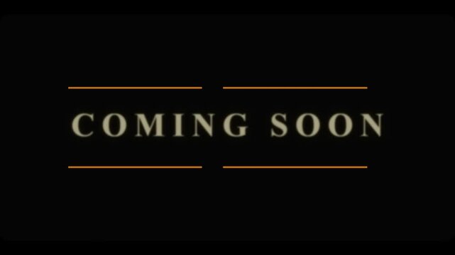 Coming soon gold text animation on black background for teaser or movie trailer.